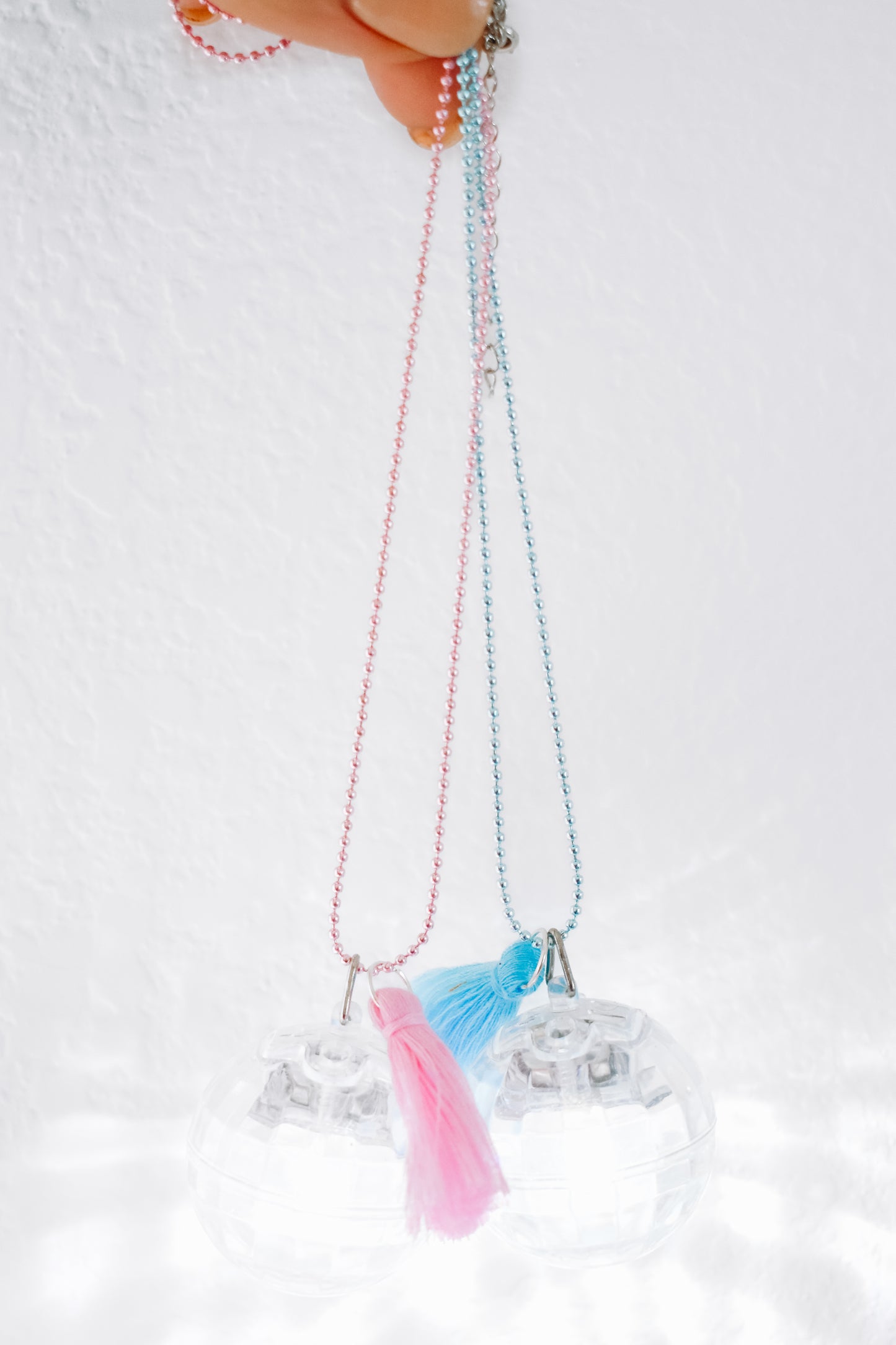 nye sample sale light up disco ball necklaces